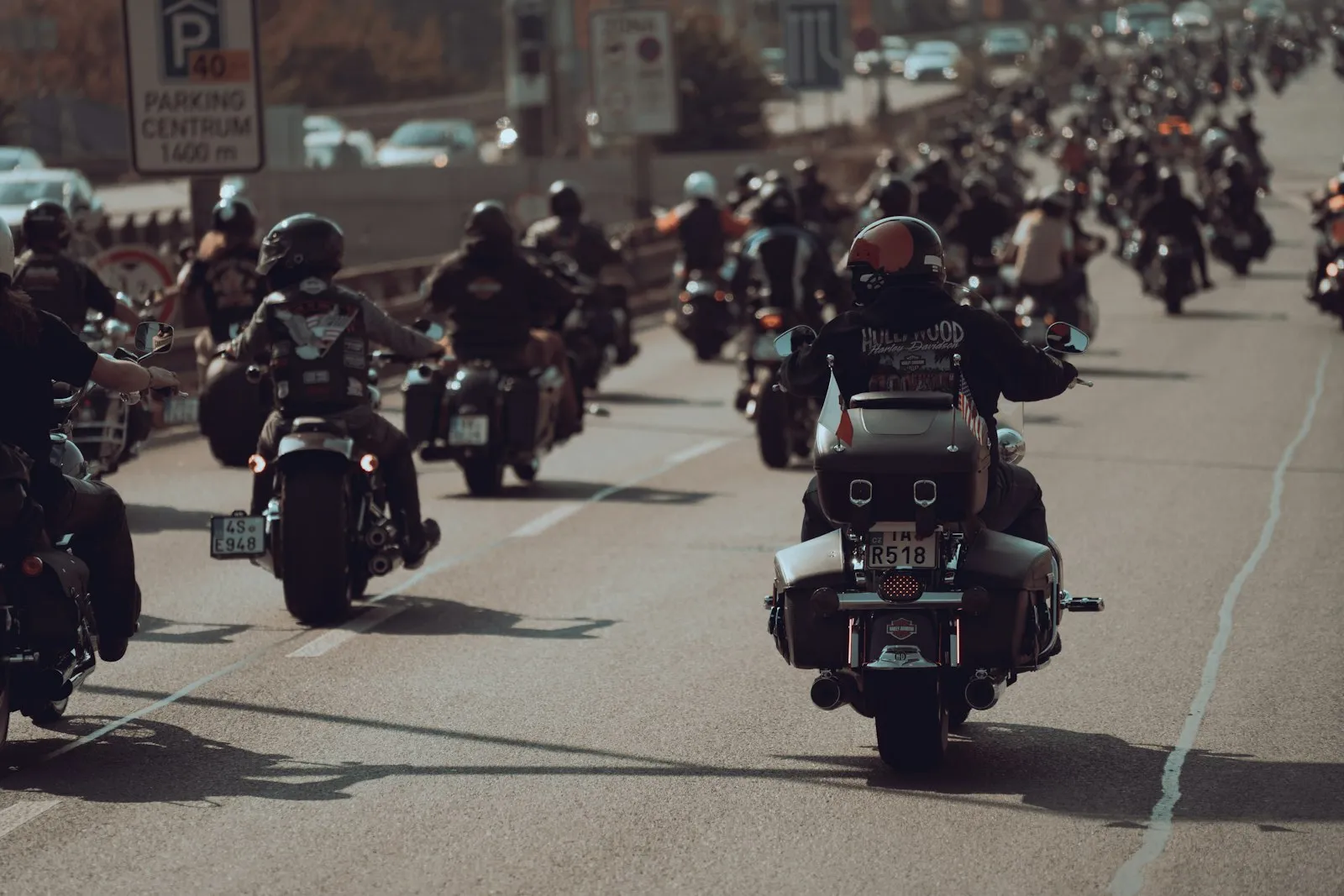 motorcycle group riding staggered formation on highway
