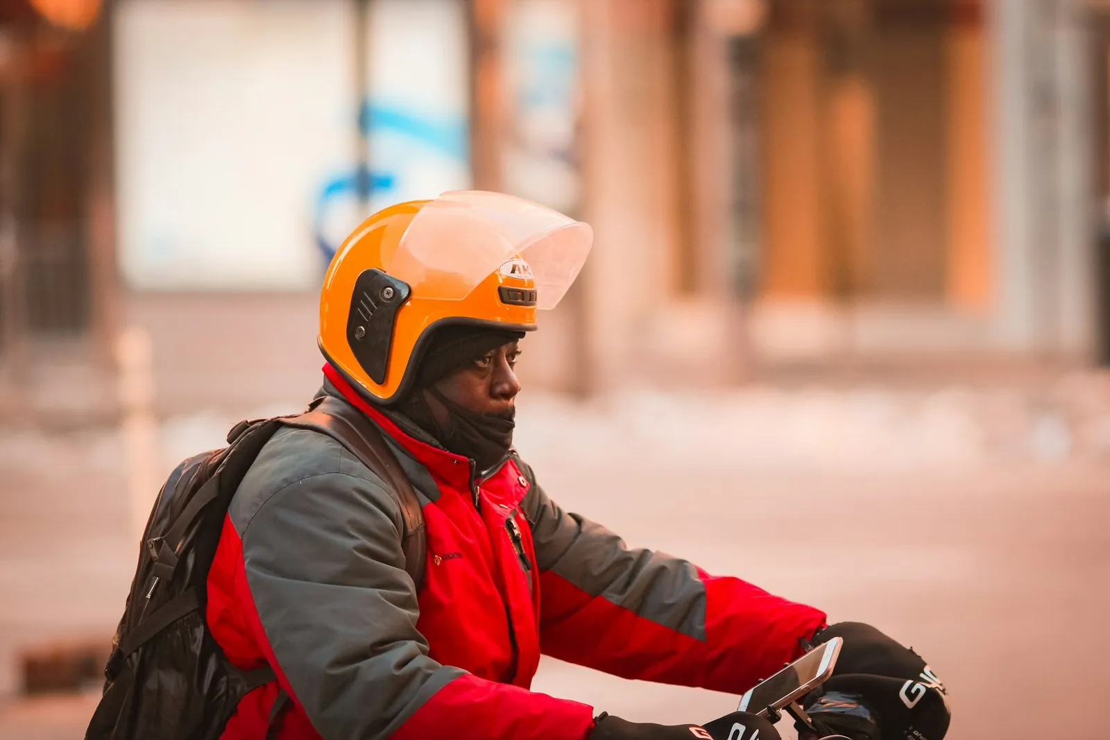 biker adjusting winter riding gear close up