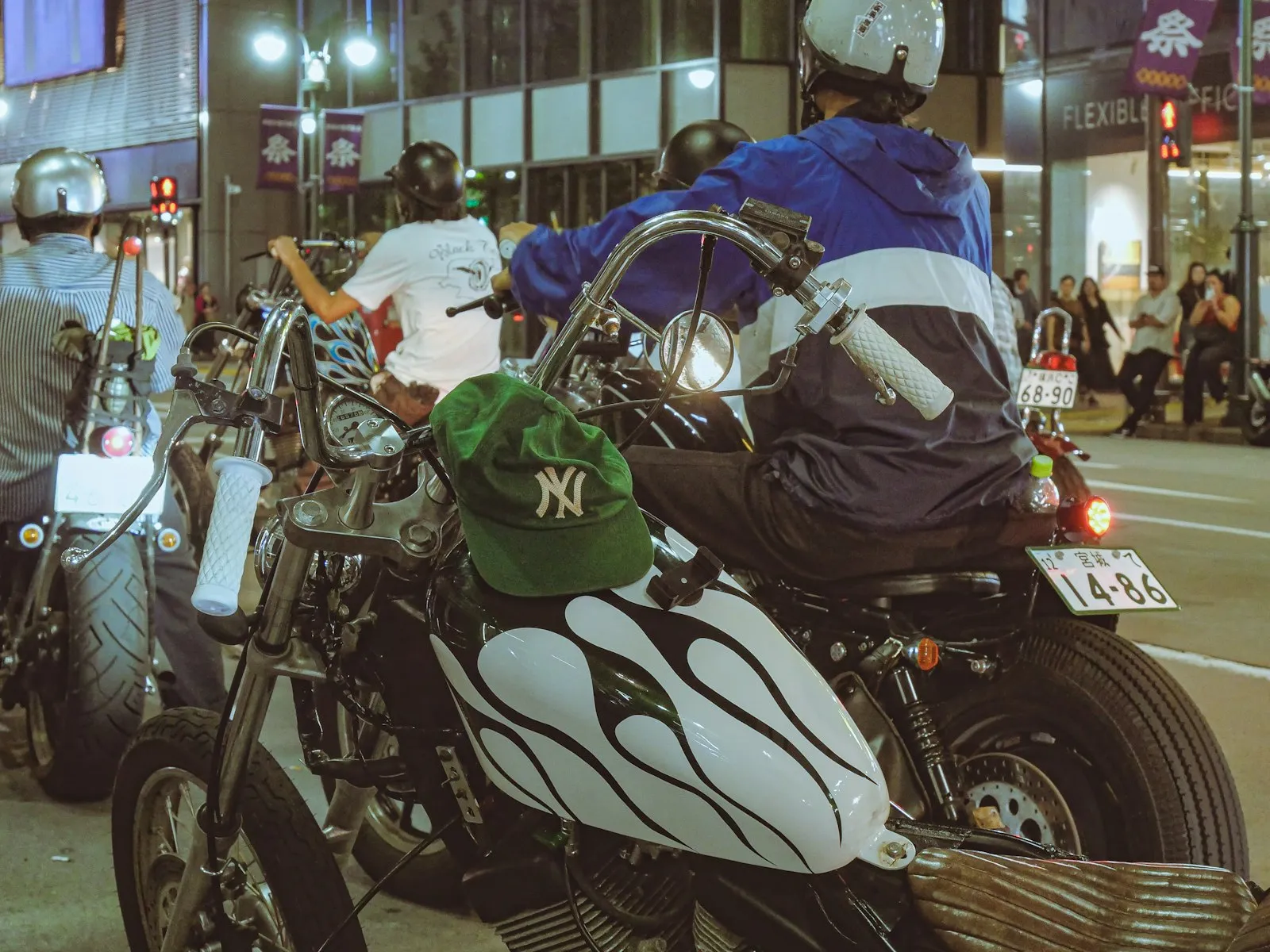 rider checking motorcycle lights before night ride